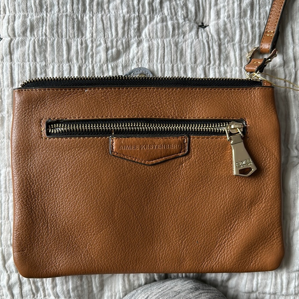 Aimee Kestenberg leather clutch with charging block